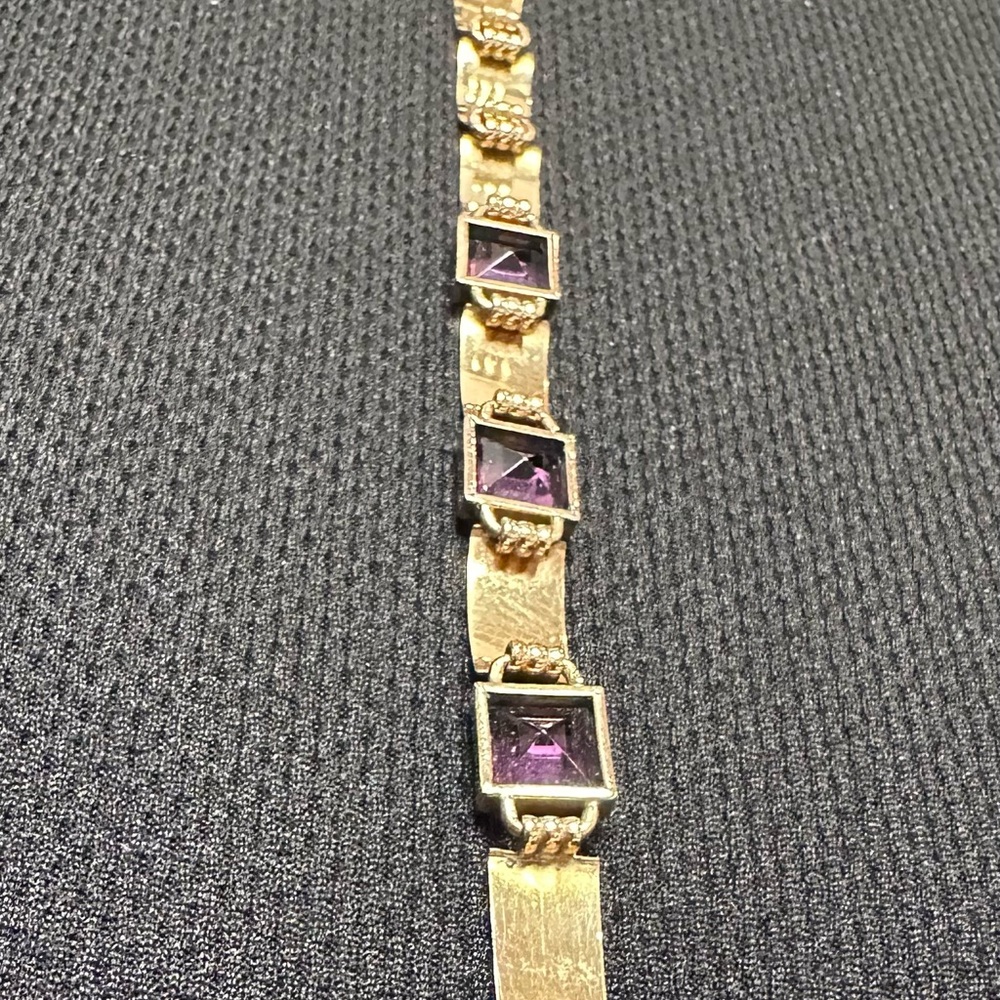 33A- Simmons Gold and three Square Purple Gemstone. Bracelet 6”